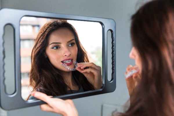 Discover why more adults prefer Invisalign Leeds over braces. Learn the benefits, lifestyle advantages, and long-term results for a confident smile.