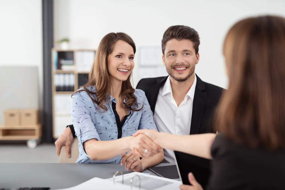 Self-employed borrower discussing mortgage approval with a professional broker
