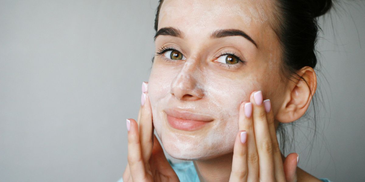 Women use whitening face wash